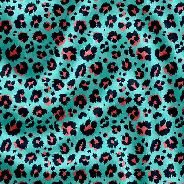 diseño animal print con fondo turqueza y pintas negras con naranjo.