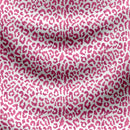 diseño animal print de fondo blanco con pintas rosadas